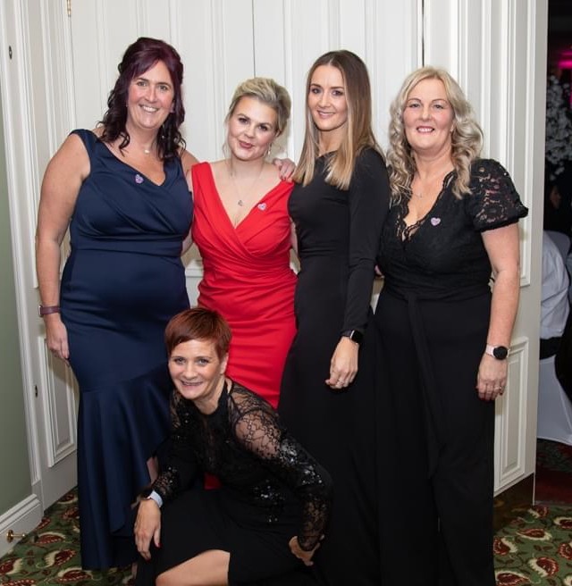 The Pink Ladies: From left - Michelle, Emily, Debbie and Jo. Claire is kneeling down at the front of the group.