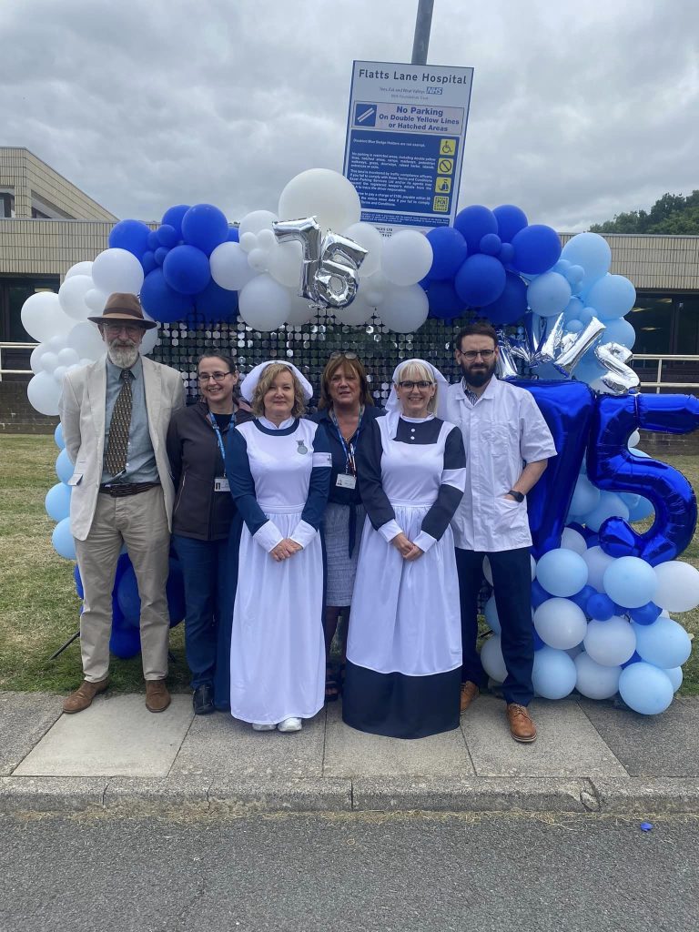 Staff dressing up for NHS75 as featured in our summer 2023 carer newsletter