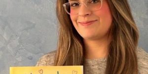 Rebecca with her book Loved Dearly