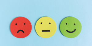 Sad, happy and neutral emoji faces