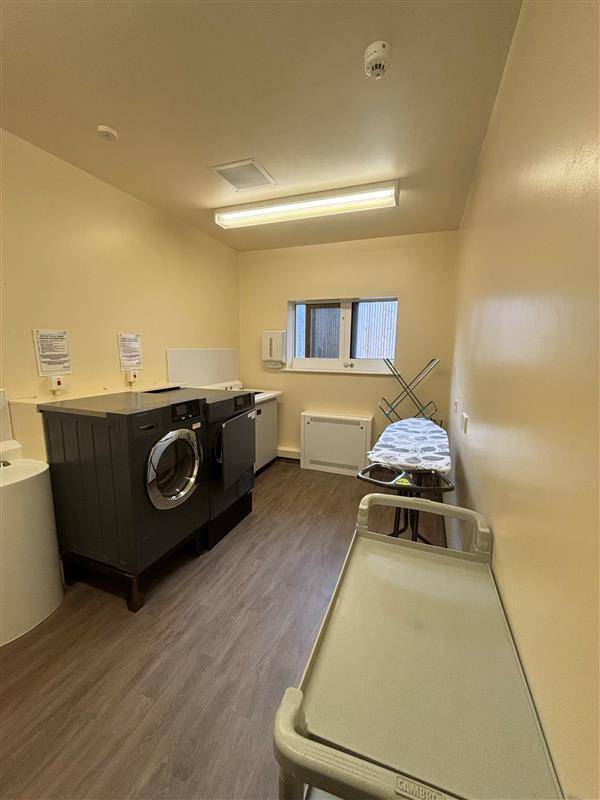 A washing machine and ironing board
