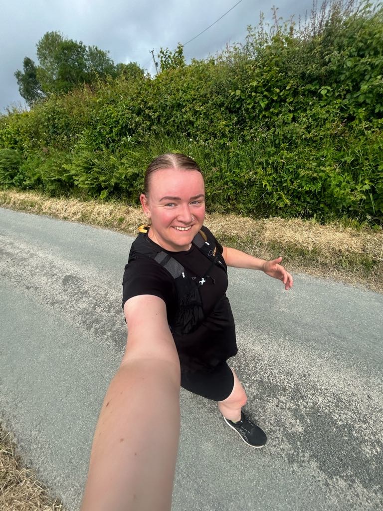 Beth Thompson taking a selfie while out road running.