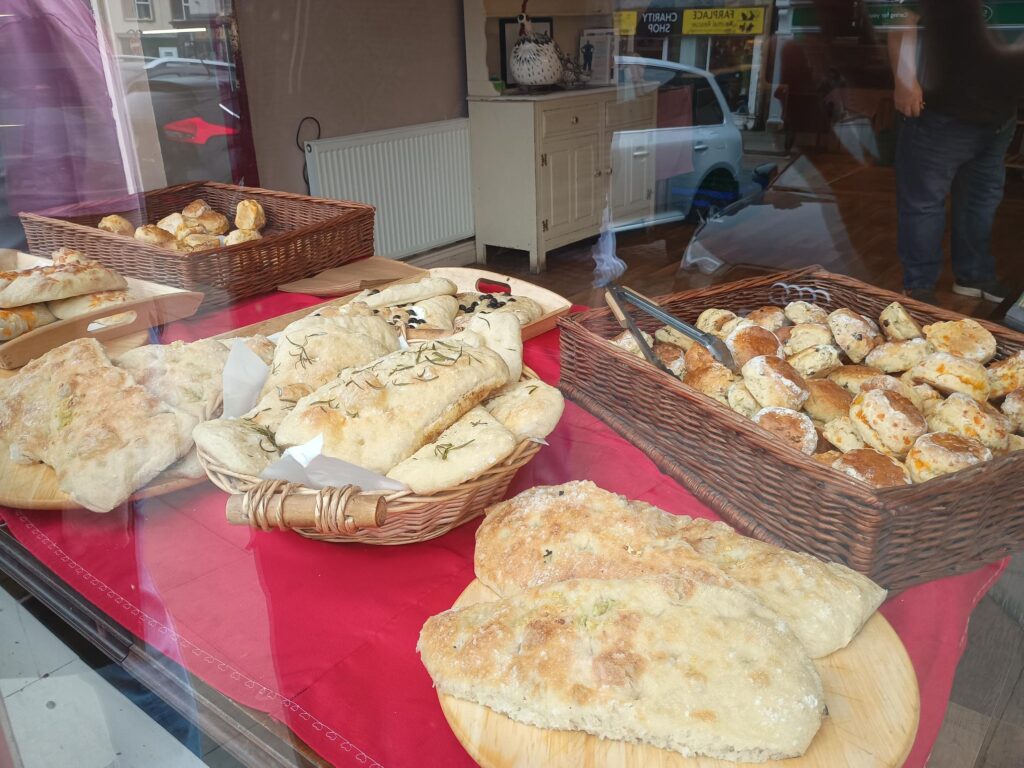 Shop window with showing different types of baked produce.