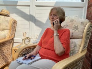 Maureen doing check and chat volunteering