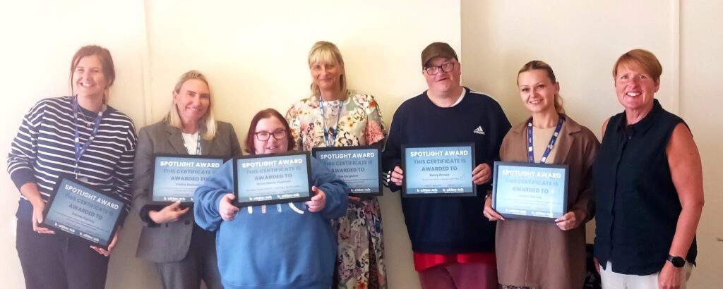 The STOMP team with patients Barry and Anne-Marie with their award certificates from Healthwatch.