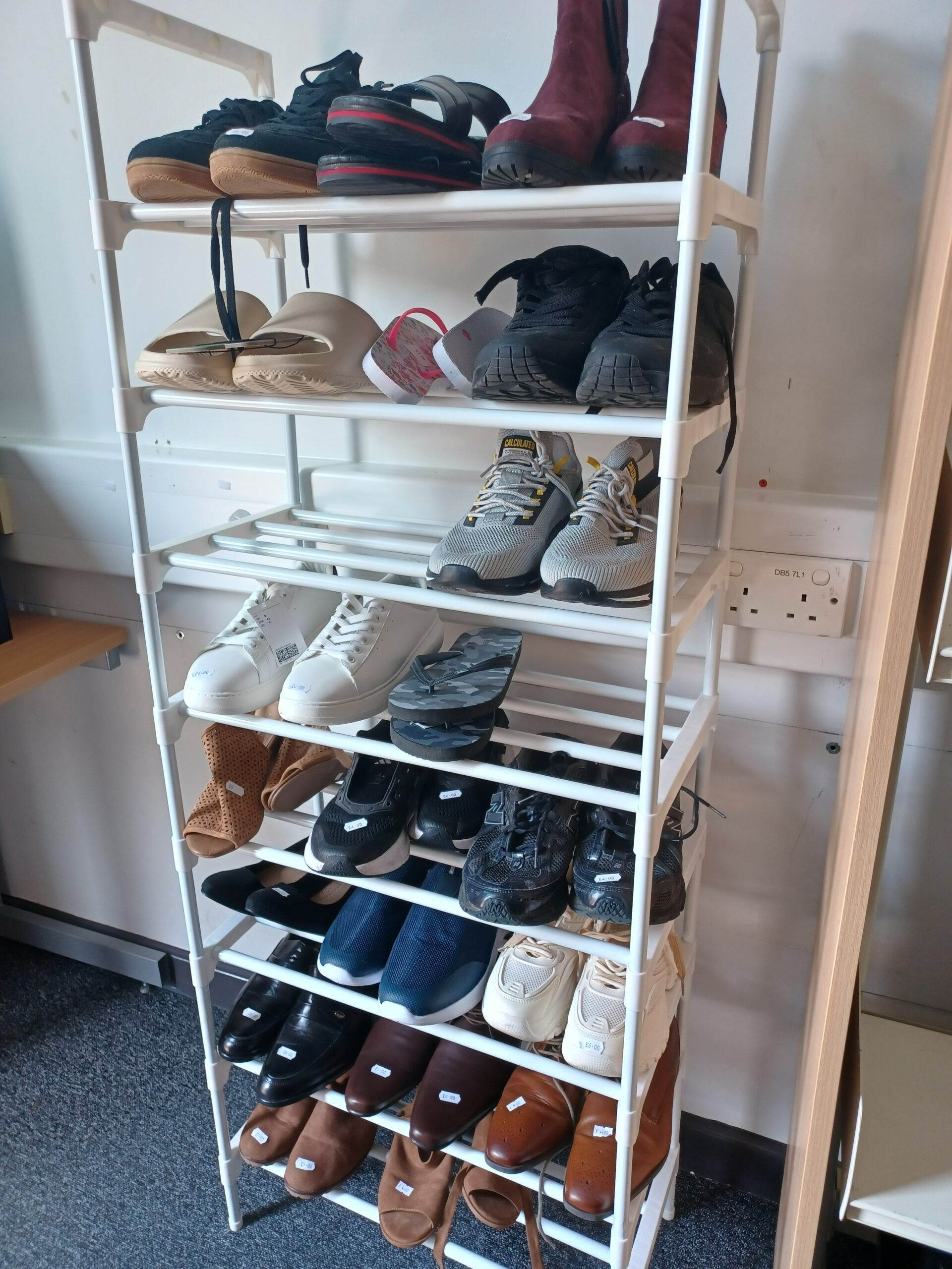 Shoes on a shoe rack