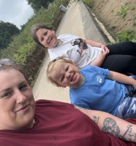 Sarah and her two daughters. Maeve is in the middle.