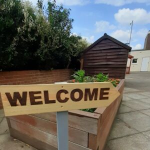 Together Garden welcome sign