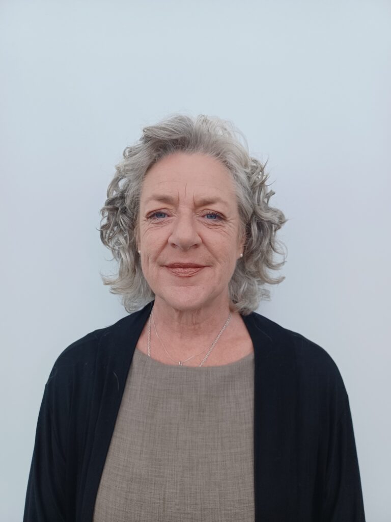 lady with grey curly hair