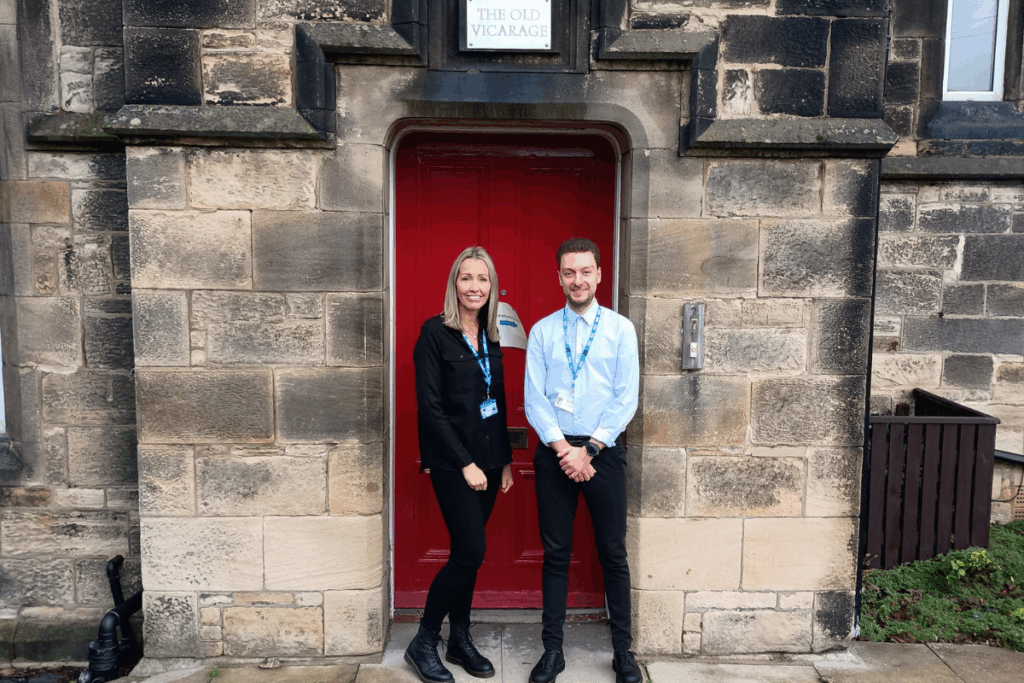 Ashley Campbell and Dr Jonathan Summerill outside the Old Vicarage