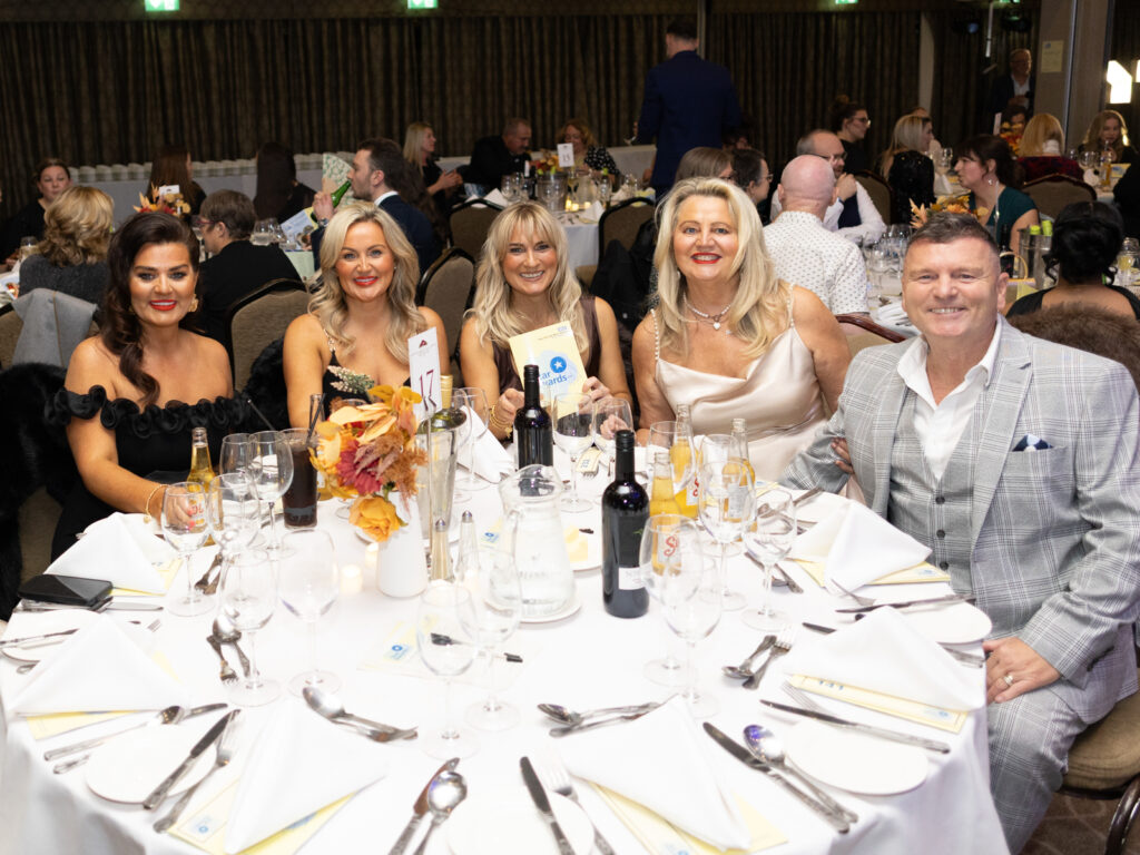 Star Awards guests sitting round a table