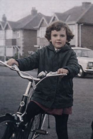 Gill as a youngster on her bike