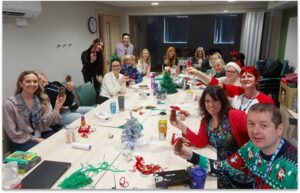 Gill celebrates her last Christmas with her CAMHS team in 2025.