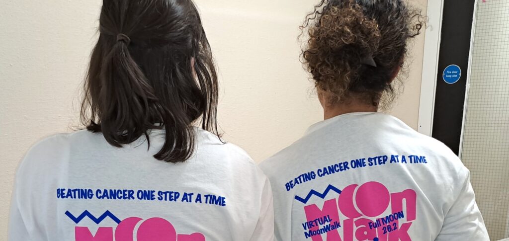 Louise and Lisa wearing their Moon Walk t-shirts.