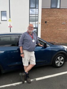 Volunteer driver Dave outside North Moor House in Northallerton