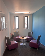 Room at The Glades with a table and 4 chairs