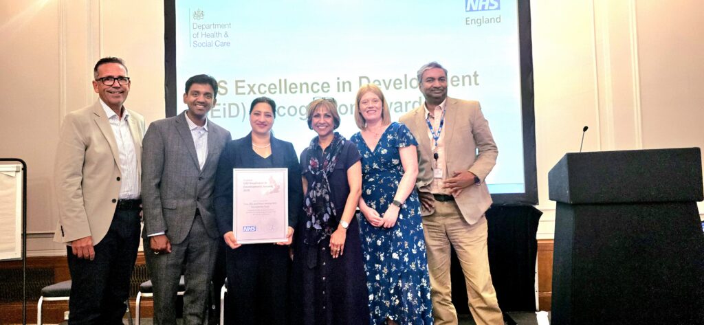Colleagues presented with certificate at the Awards