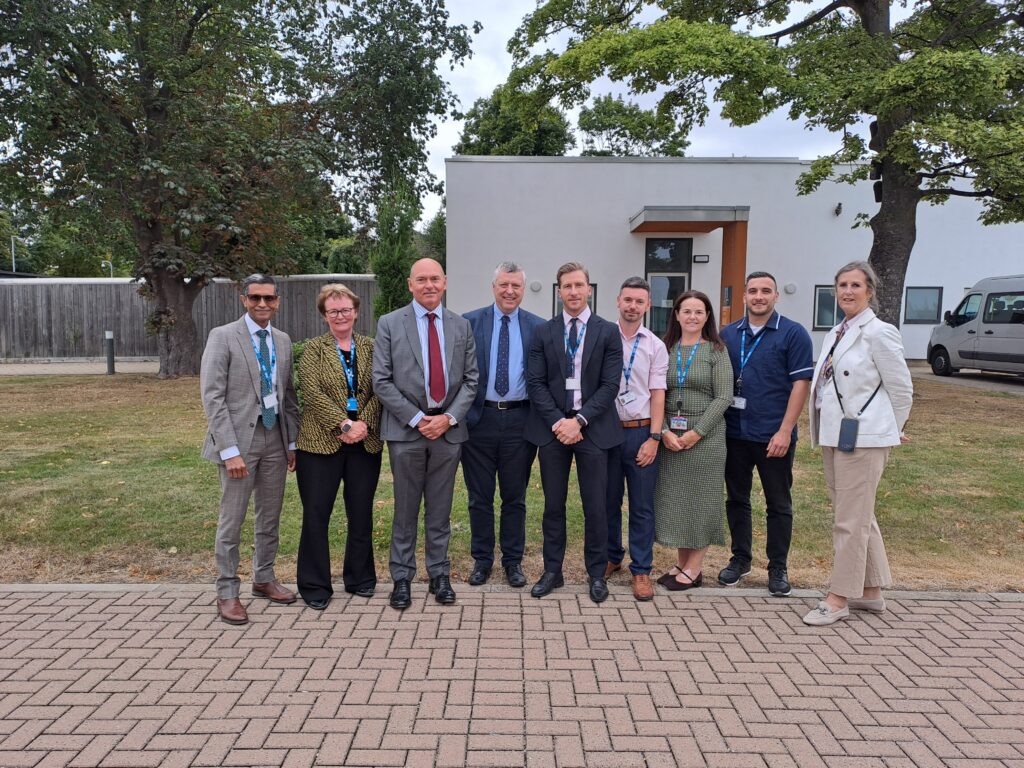 NHS directors stood in a group with TEWV staff