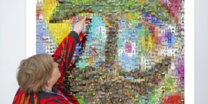 Rachel points to her photo on the Tree of Life