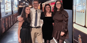 members of staff from the Bluebell apartments at the Inclusion North awards ceremony. wearing smart clothes and stood together smiling