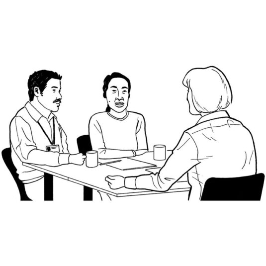 People sat together at a meeting