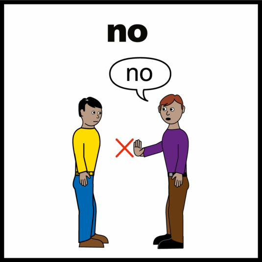 two people stood. one is holding their hand out and saying no to the other